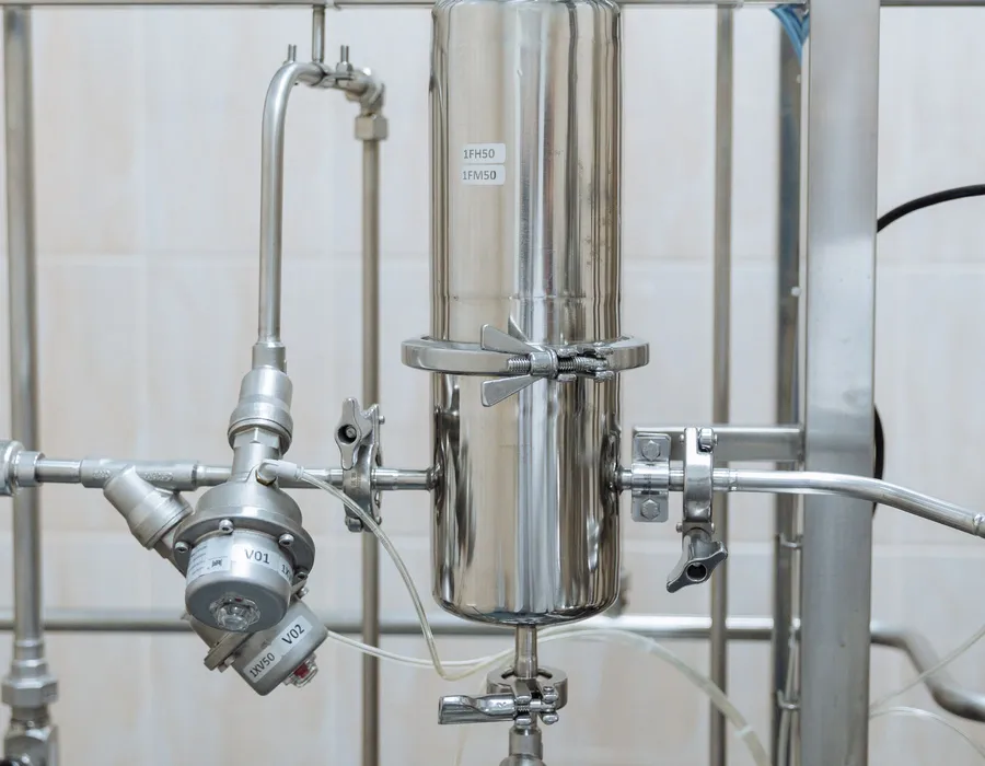 The same commercial RO system after servicing, with new filters and restored output