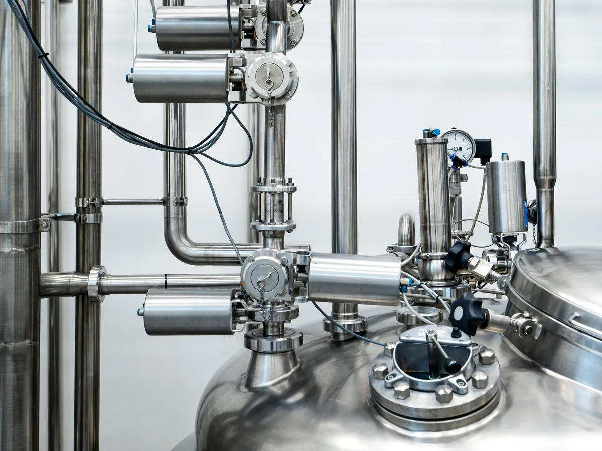 Service engineer maintaining a commercial RO water purification plant at a corporate facility in Lucknow