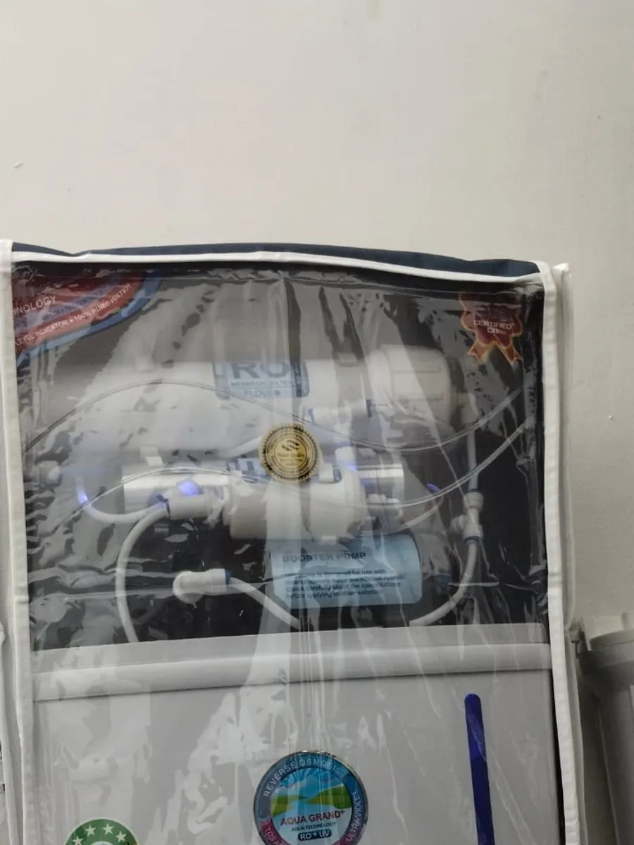 New Aqua Grand RO in Domestic, Lucknow — Fitted with protective cover, booster pump and inline filters.