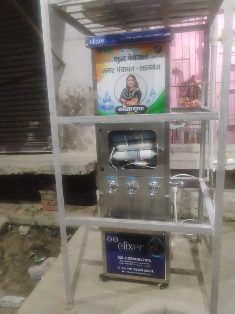 Public water ATM in Nagar Panchayat, Lalganj, Lucknow — RO + UV + UF + TDS unit built into a municipal drinking-water booth.
